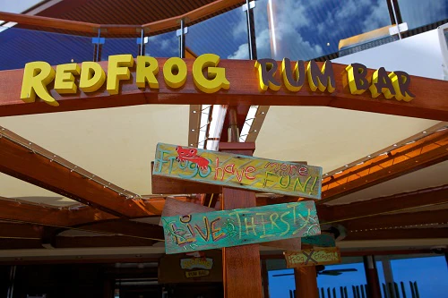 the redfog rum bar sign on a carnival ship