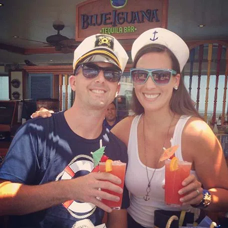 a couple with drinks at blueiguana tequila bar